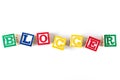 Blogger - Alphabet Baby Blocks on white Royalty Free Stock Photo