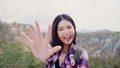Blogger Asian backpacker woman record vlog video on top of mountain, young female happy using mobile phone make vlog video enjoy Royalty Free Stock Photo