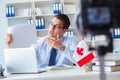 The blogger doing webcast on canadian immigration to canada Royalty Free Stock Photo