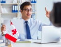 Blogger doing webcast on canadian immigration to Canada Royalty Free Stock Photo