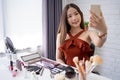 Blogger professional makeup beautiful young Asians are taking selfie