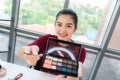 Blogger,recording video tutorial online concept.Young Asian woman makeup artist youtuber influencer broadcasting demonstrating her Royalty Free Stock Photo