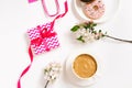 Blogger \'s workplace . Morning breakfast with a cup of coffee, donuts and a gift box for a birthday or Valentine\'s day
