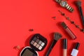 Blogging Beauty Concept. Professional women`s cosmetics, accessories, watches, bracelet. Female ideas and background. Red