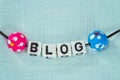 Blogging concept - letters on blue fabric Royalty Free Stock Photo