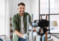 man or blogger repainting old table at home