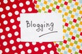 Blogging - word on colorful blackboard, internet blog and communication concept