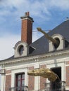 Blois, France - 07/2014: House of Magician Robert-Houdin with figures of dragons with spectacles, museum and interactive site on Royalty Free Stock Photo