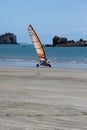 Blokart racing across the sand