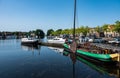 Blokzijl, Overijssel, The Netherlands, Pleasure harbor and banks of the canal against blue sky Royalty Free Stock Photo