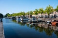 Blokzijl, Overijssel, The Netherlands, Pleasure harbor and banks of the canal against blue sky Royalty Free Stock Photo