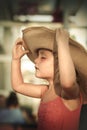 Blond baby girl with summer hat on the beach Royalty Free Stock Photo