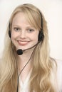 Blond beautiful girl in the Call center Royalty Free Stock Photo