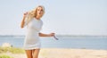 Blond beautiful woman on the beach Royalty Free Stock Photo