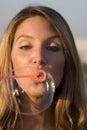 Blond Blows Bubbles Royalty Free Stock Photo