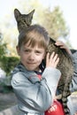 Blond boy with oriental bred cat