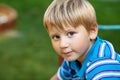 Blond boy outdoors Royalty Free Stock Photo