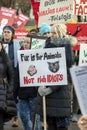 Blond caucasian woman hold no sign in her hand in the crowd of activists at Animal Advocacy protest
