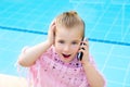 Blond child little girl talking mobile phone Royalty Free Stock Photo