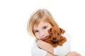 Blond children girl with dog puppy mini pinscher