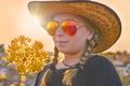 Blond country girl with sunglasses Royalty Free Stock Photo