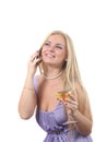 Blond in a dress drink Martini and speak phone Royalty Free Stock Photo