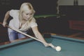 Female playing pool