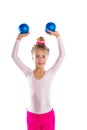 Blond fitness kid girls exercise sand balls workout Royalty Free Stock Photo