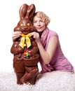 Blond Girl Adjusting Bowtie of a Chocolate Easter