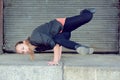 Blond girl dancing break dance on the street Royalty Free Stock Photo