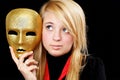 Blond girl with gold mask