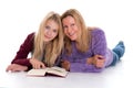Blond girl and her mother using tablet PC Royalty Free Stock Photo
