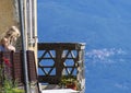 Little blonde girl looking out over the lake. Royalty Free Stock Photo