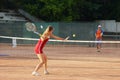 Blond girl playing tennis Royalty Free Stock Photo