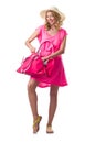 Blond girl in summer pink clothing isolated on