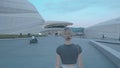 Blond hair walking around modern architecture style buildings 4K footage