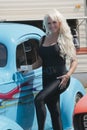Blond with hotrod Royalty Free Stock Photo