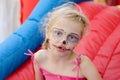 Blond kid with facepainting Royalty Free Stock Photo