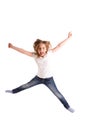 Blond kid girl indented jumping high wind on hair Royalty Free Stock Photo