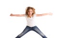 Blond kid girl indented jumping high wind on hair Royalty Free Stock Photo