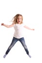 Blond kid girl indented jumping high wind on hair Royalty Free Stock Photo