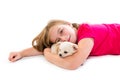 Blond kid girl with puppy chihuahua pet dog