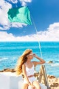 Blond kid teen girl on the beach long curly wind hair Royalty Free Stock Photo