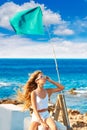 Blond kid teen girl on the beach long curly wind hair Royalty Free Stock Photo