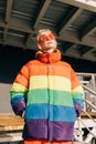 Androgyne Woman in the rainbow jacket