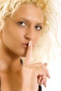 Blond making a silence sign Royalty Free Stock Photo