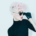 blond model in vintage glasses with stylish haircut. fashion photo Royalty Free Stock Photo