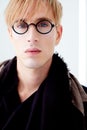 Blond modern student man with nerd glasses Royalty Free Stock Photo