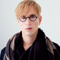 Blond modern student man with nerd glasses