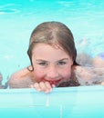 Blond preteen girl in swimming Royalty Free Stock Photo
